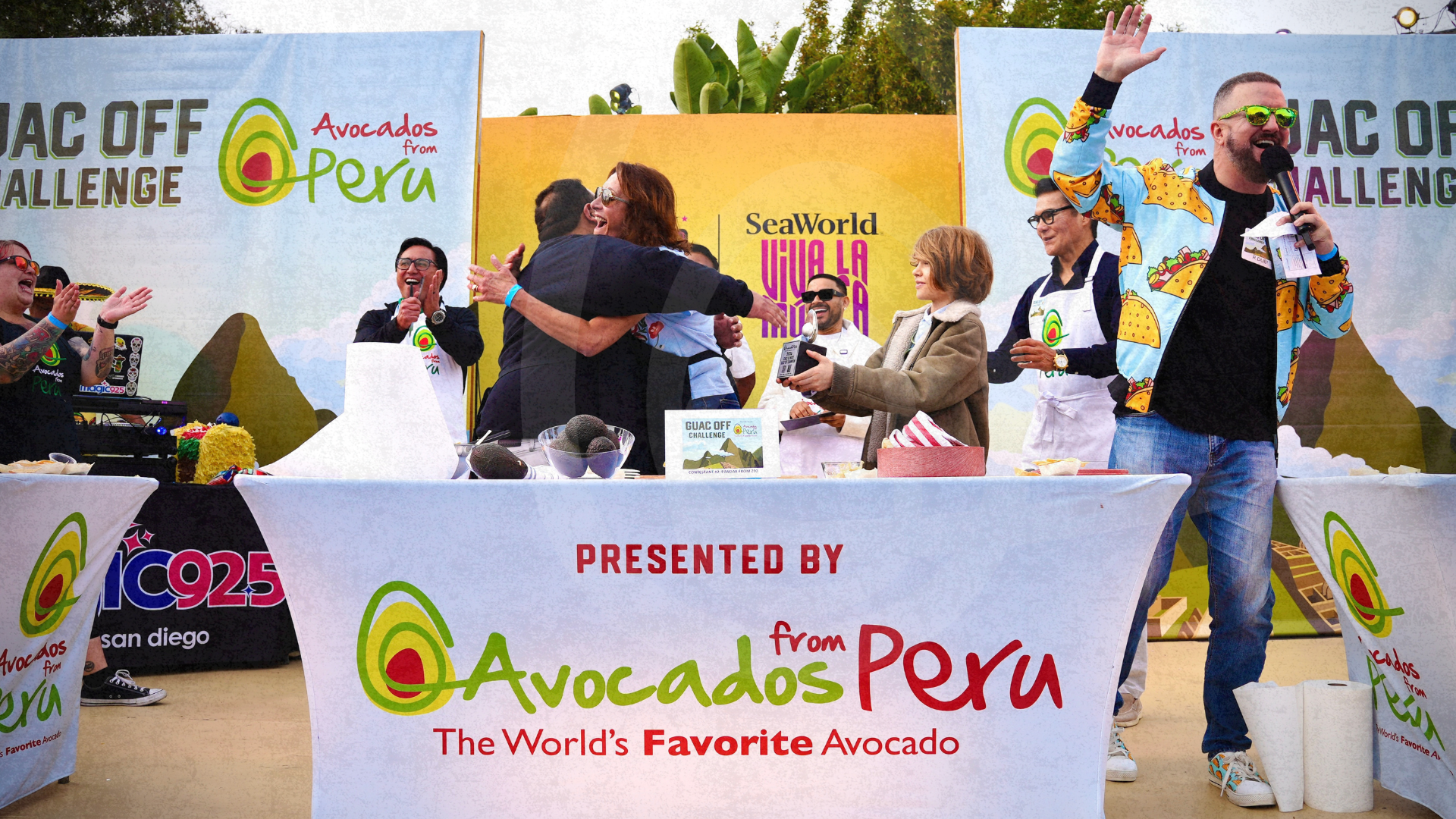 Guac Off Challenge contestants celebrate on stage during the Avocados From Peru live DJ competition at SeaWorld San Diego.